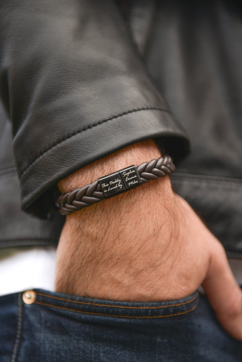 Men's braided leather bracelet with personalised engraved clasp dark background