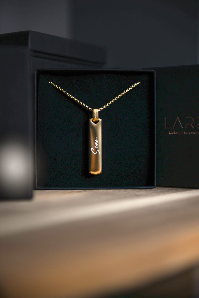 Men's gold engraved bar necklace display personalised custom name