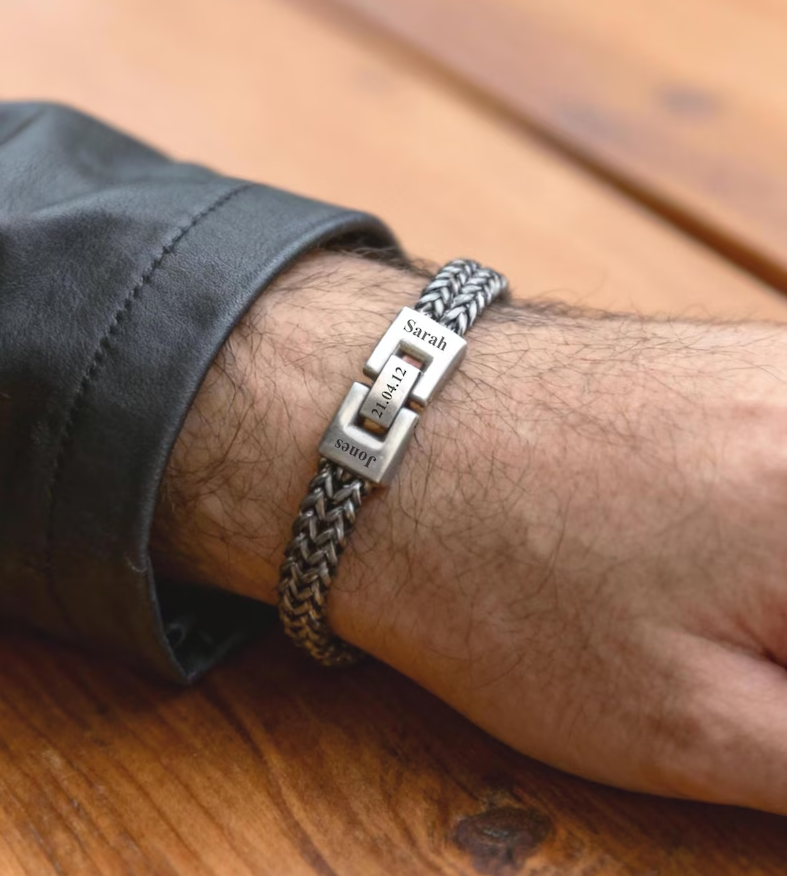 Men's personalised foxtail chain bracelet flat lay on wooden surface stainless steel