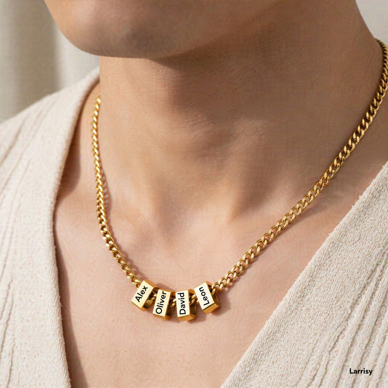 Close up of men's gold Cuban link chain necklace on neck stainless steel