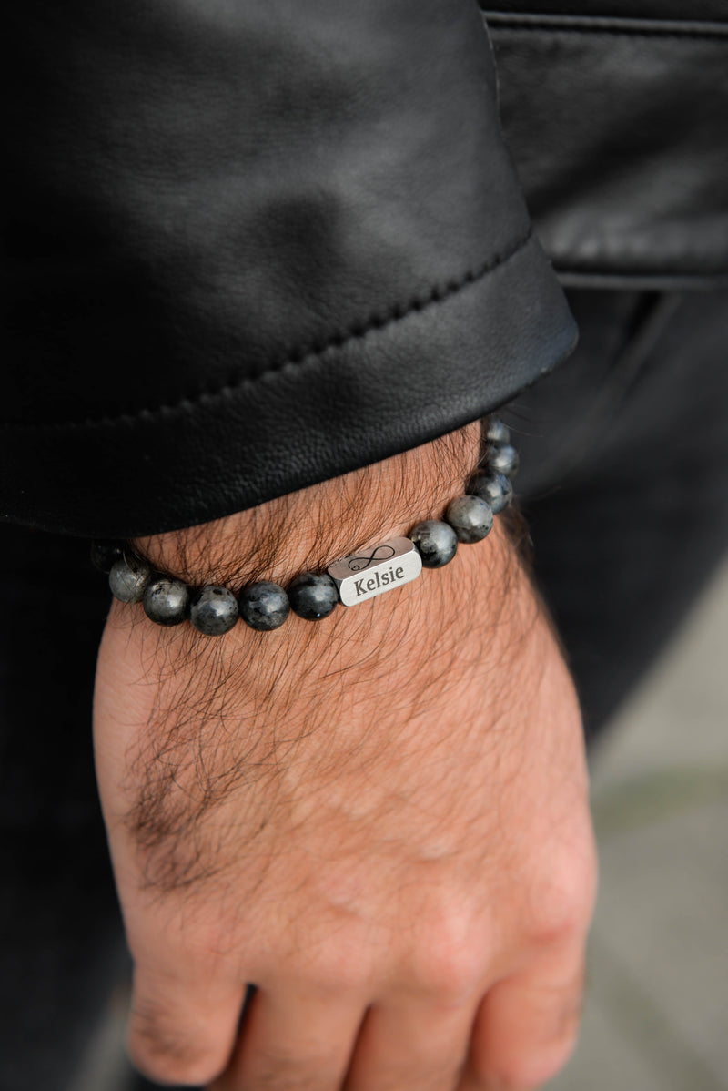 Men's lava stone and larvikite bracelet with leather jacket lifestyl