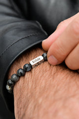 Men's lavrakite stone bracelet close up hand stainless steel engraved plate