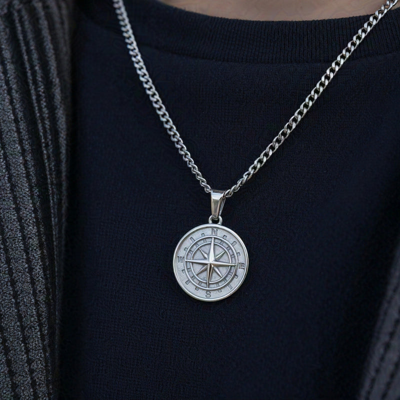 Close up of men's silver North Star pendant necklace stainless steel personalised