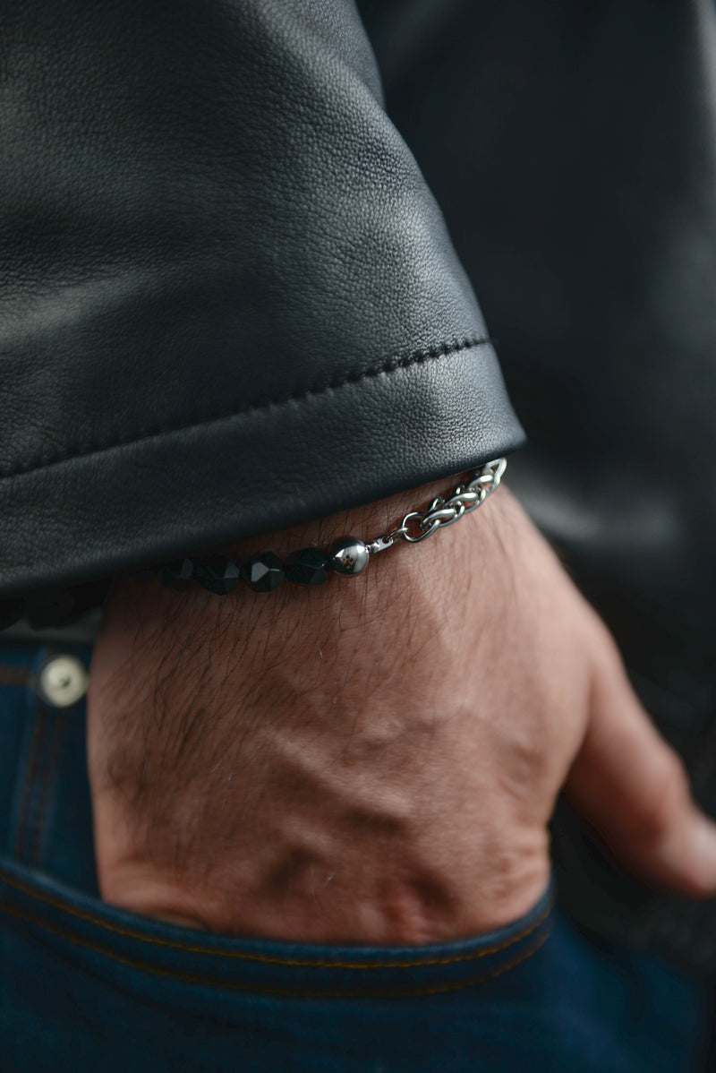 Men's silver and black bead chain bracelet front view on wrist stainless steel
