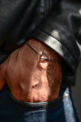 Men's triangle bracelet front view on wrist silver gold black stainless steel